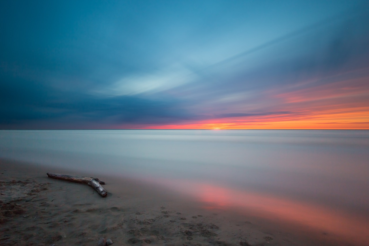 beach, driftwood, sunset-1846688.jpg